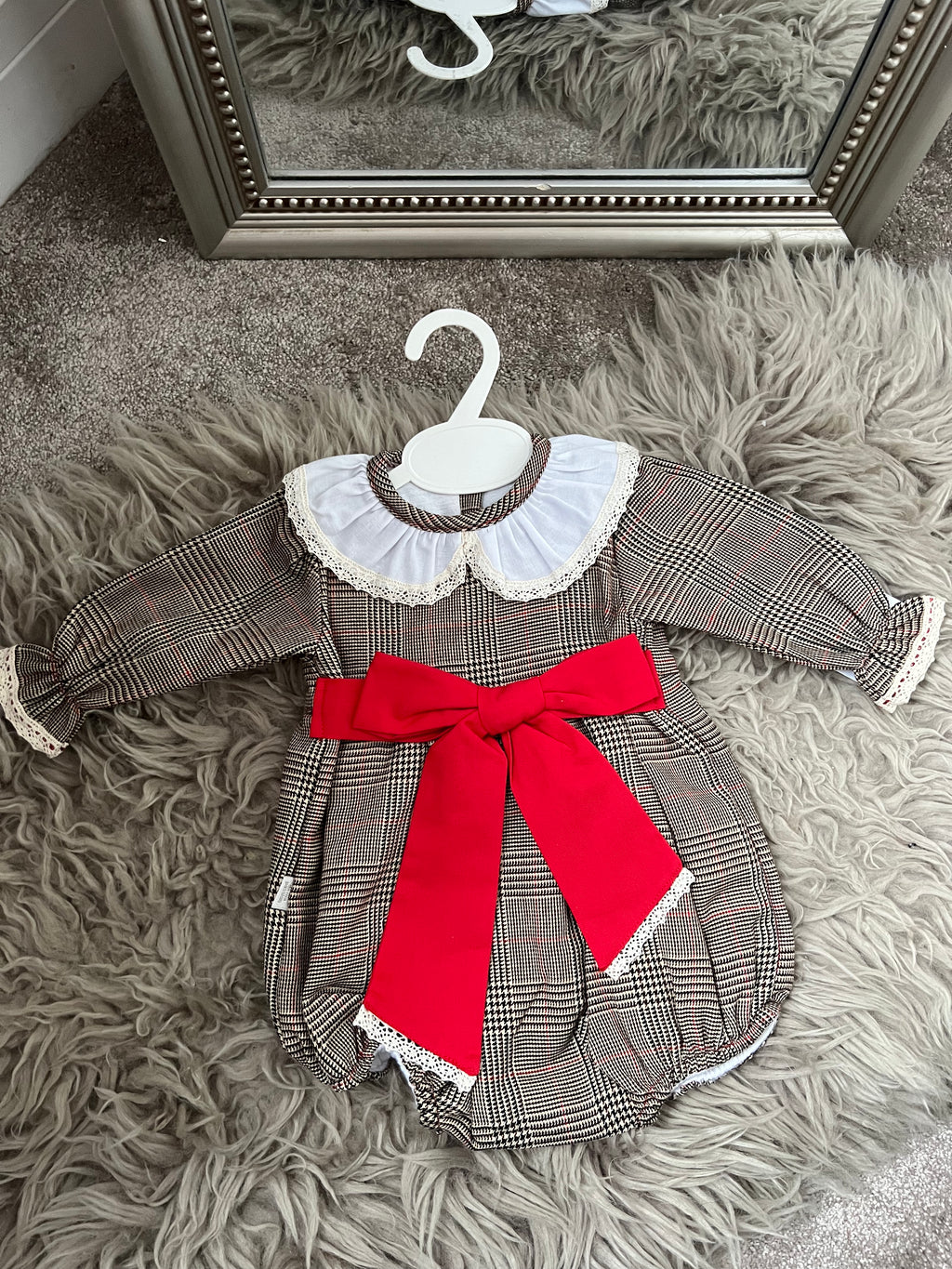 Checked red bow romper