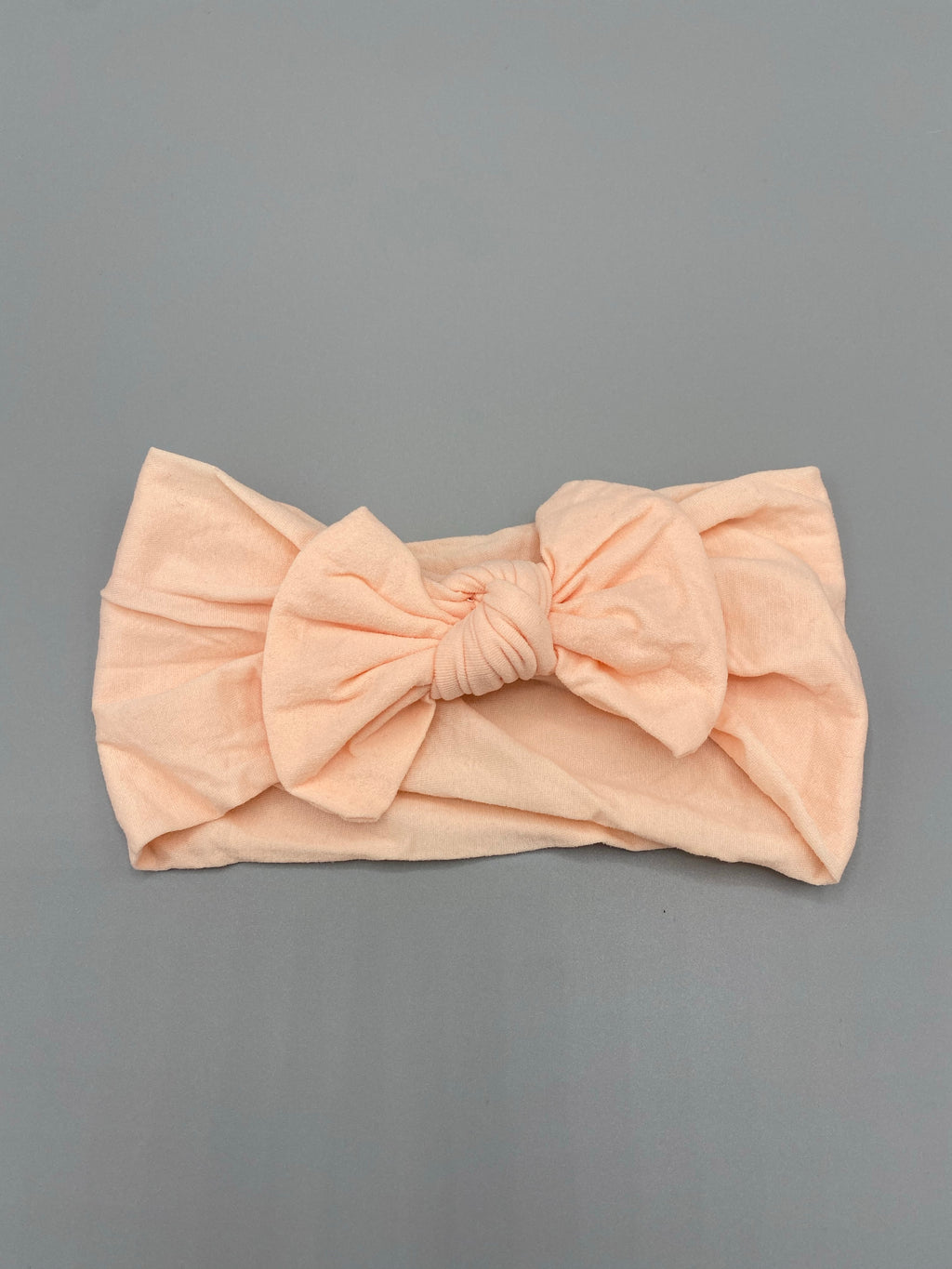 Peach bow headband